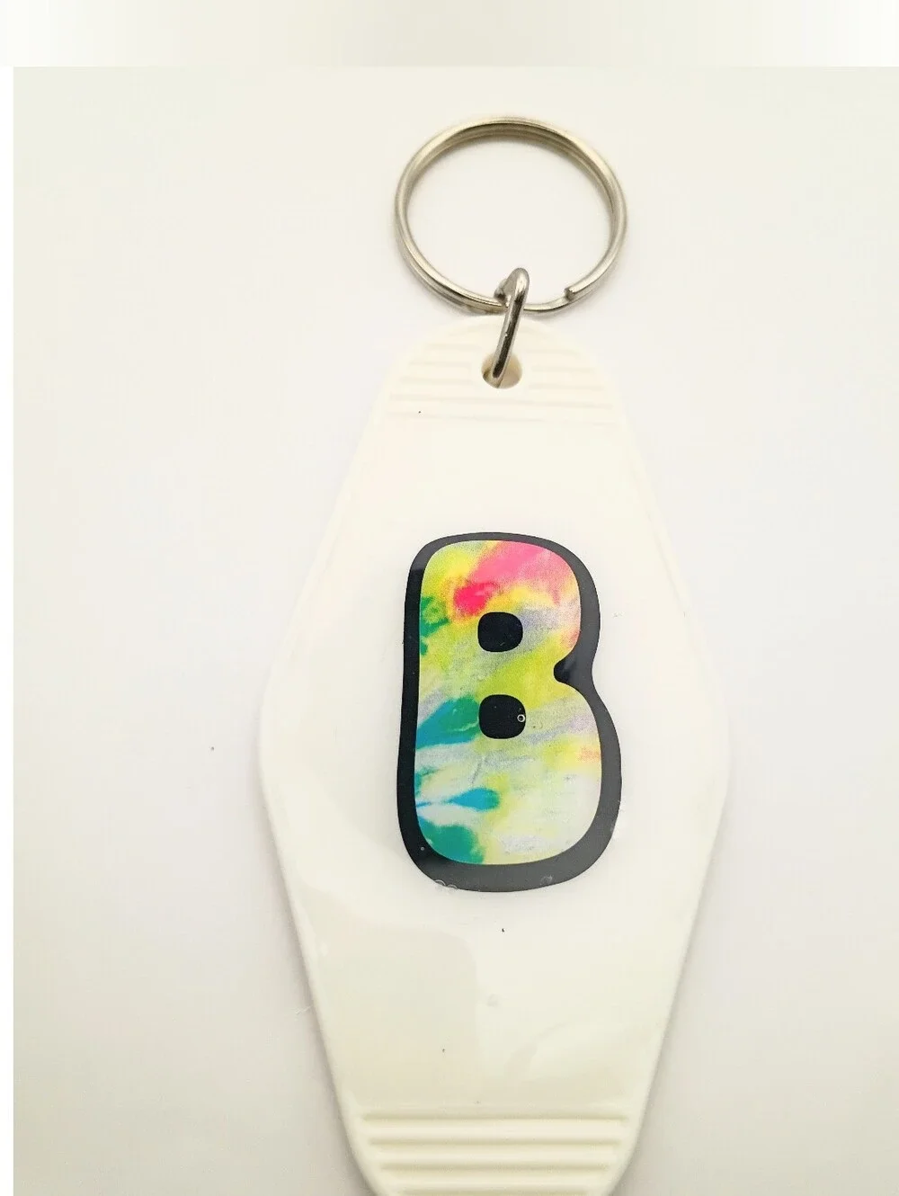 White Keychain Fob with Multicolor 'B' Accent